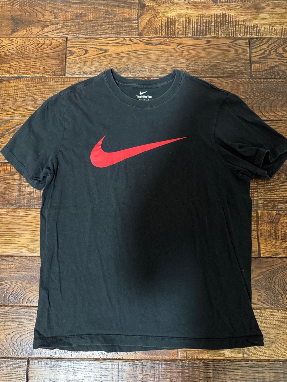 Nike Black Short Sleeve Tee with Red Swoosh Logo
